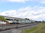 One of the few Tri-Rail GP49PH-3 locomotives leads a southbound into Miami Airport Station 